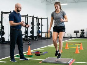 Patient working with a provider at a performance physical therapy clinic in Raleigh, NC during return-to-sport testing